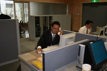 Mr. Egawa, working in the office of UBIC
