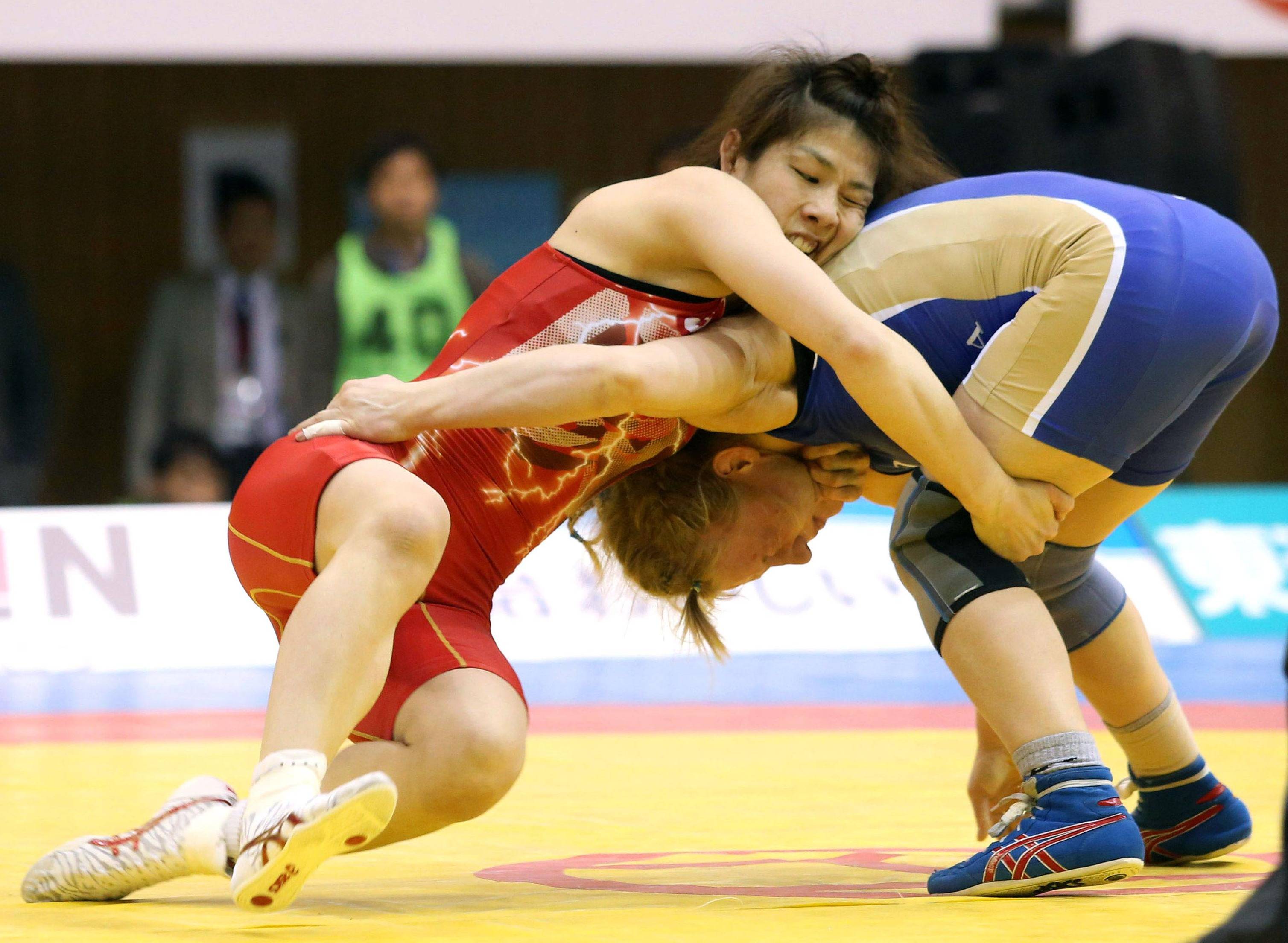 Wrestler wearing red shorts